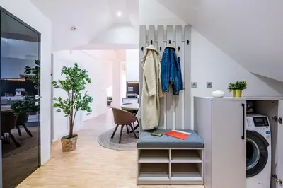 a laundry room with a washer and dryer at Prague Days - Three Bedroom Apartment with Terrace and AC in Prague