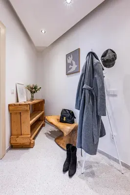 a room with a desk and a towel hanging on a wall at Prague Days - Two Bedroom Riverside Apartment with Gramophone in Prague