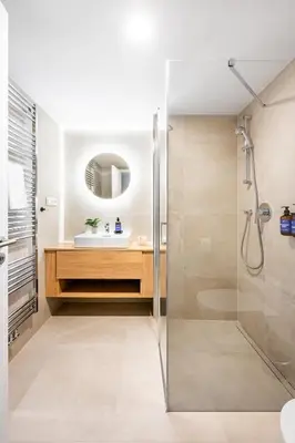 a bathroom with a shower and a sink at Prague Days - One Bedroom Apartment with Garage and Workspace in Prague