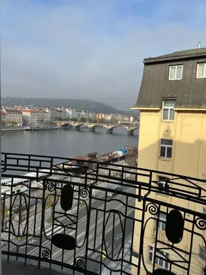 a view of a river from a balcony at Quiet Apartment Farmers' Saturday Market in Prague