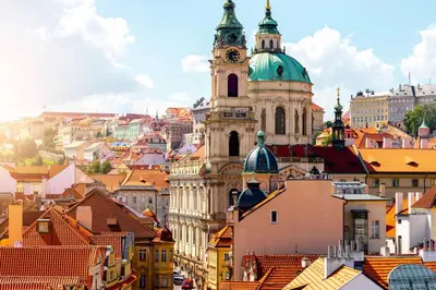 a view of a city with a clock tower at Romantic Apt with Secret Terrace - Old Town Prague in Prague