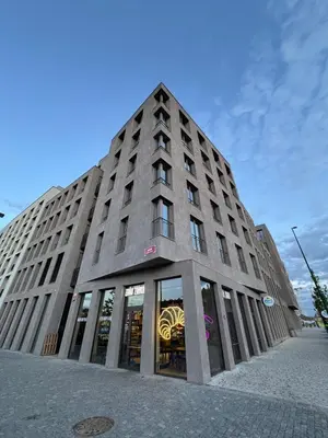 a tall building with a building with windows at Prague Anděl Quiet Comfy apartment in Prague