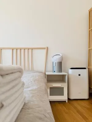 a bedroom with a white bed and a blender at Prague Anděl Quiet Comfy apartment in Prague