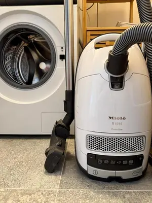 a washer and dryer next to a washing machine at Prague Anděl Quiet Comfy apartment in Prague