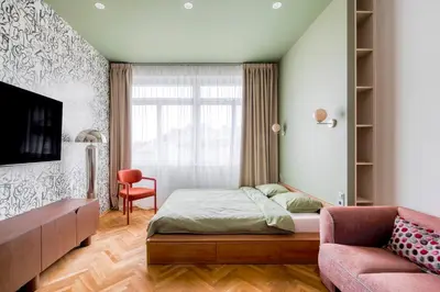 a small bedroom with a bed and a couch at Boutique Studio just 5 min from Wenceslas Square by Gravity Prague in Prague