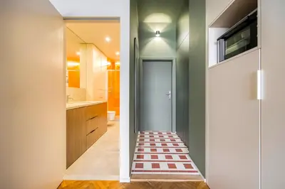 a bathroom with a walk in shower next to a door at Boutique Studio just 5 min from Wenceslas Square by Gravity Prague in Prague