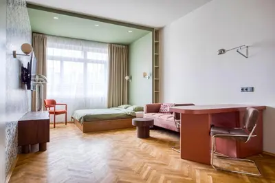 a living room with a table and a couch at Boutique Studio just 5 min from Wenceslas Square by Gravity Prague in Prague