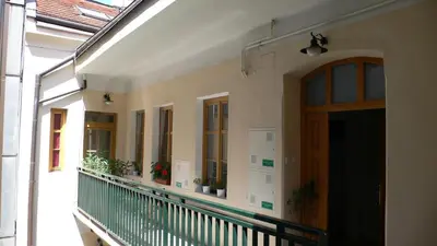 a balcony of a building with plants on it at Palladium family apartment in Prague