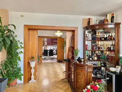 a room with a bar with a violin in it at Villa with swimming pool near Prague in Kamenice