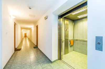 an empty corridor of an office building with a hallway at AP Antonie in Prague