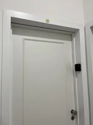 a white door with a lock on top of it at The new brickhouse apartment in Prague