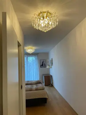 a bathroom with a toilet and a sink at Appartment Oliva in Prague