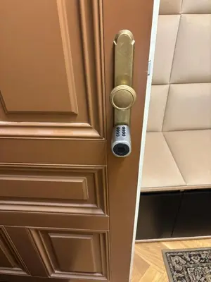 a wooden door with a door knob on it at Nekázanka Boutique Apartment - Near Wenceslas Square in Prague