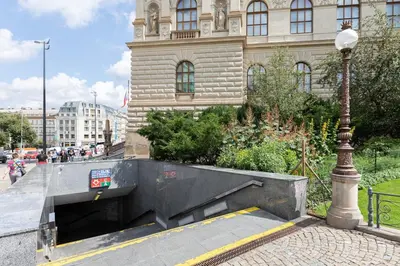 a tunnel in front of a building with a street light at Entire unit next to Wenceslas Square in Prague