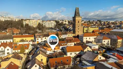 an aerial view of a city with a clock tower at Apartmán U Hluboké studny in Rakovník