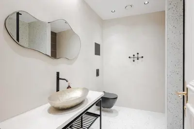 a bathroom with a bowl sink and a mirror at LUXURY Apartman 2 min CHARLES BRIDGE in Prague