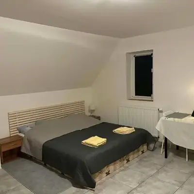 Moderní podkrovní garsonka s hezkým výhledem