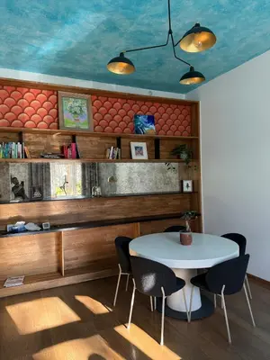 a dining room with a table and chairs at Duplex Design Flat 3 Bäder Garten 160 m2 in Prague