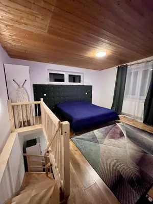 a small room with a bed in a house at ZANIK Cozy Haven in Prague