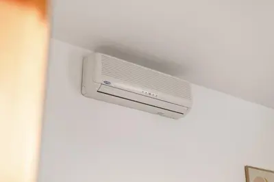 a air conditioner on the ceiling of a room at Skyline 127m Residence with Terrace - Prague Castle View in Prague