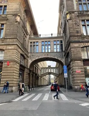 a building with an archway on a city street at Prague 1 Apartment Nekázanka in Prague