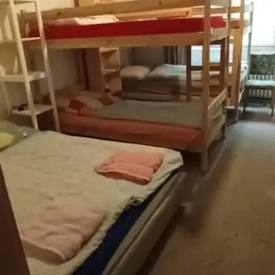 Bed in shared dormitory near the city centre