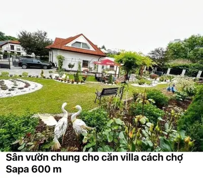 a bedroom with a bed and a couch in it at Cozy Sapa Stay - Private Garden House in Prague