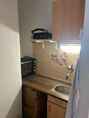 a bedroom with a bed with red lights on the floor at Peaceful apartment - centre in 10 min in Prague