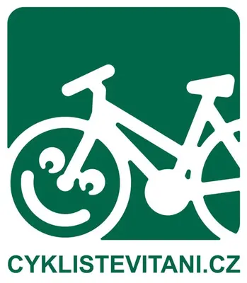 a white bike logo on a green background at Camp Litomerice in Litoměřice