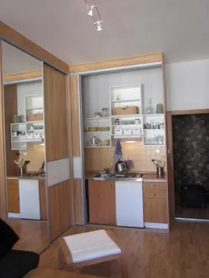 a kitchen with two sinks and cabinets in a room at Prague City Loft And Studio in Prague