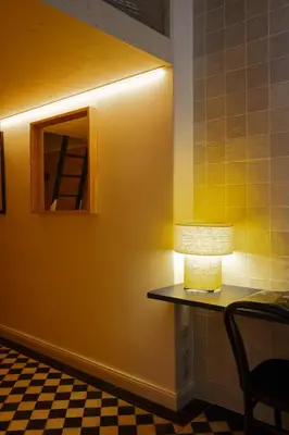 a lamp sitting on a table in a room at Bohemian Mystery by Prague Castle in Prague