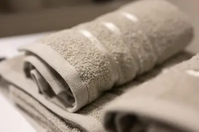 a rolled up towel sitting on top of a table at Bohemian Mystery by Prague Castle in Prague