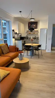 a living room with a couch and a table at The Shalom in Prague