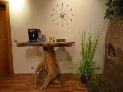 a table made out of a tree stump at Apartment mit Terrasse by Interhome in Prague