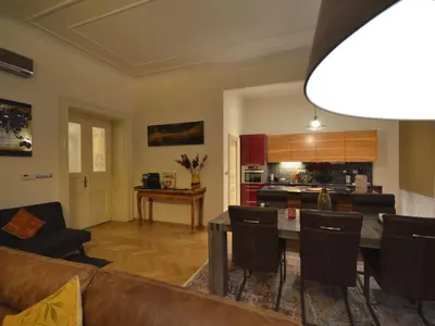 a living room with a couch and a table at Apartment Wohnung mit eigenem Balkon by Interhome in Prague
