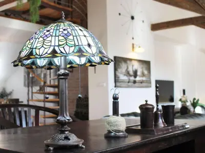 a lamp sitting on top of a table at Apartment Apartment mit Waschmaschine und Geschirrspüler by Interhome in Prague