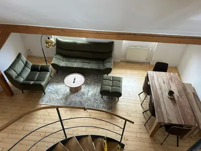an overhead view of a living room with a couch and a table at Náměstí Míru 13 in Prague