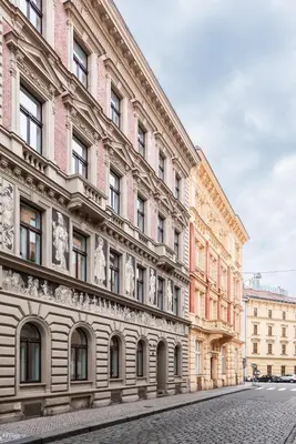 a large building with paintings on the side of it at Premium City Center Apartment Prague - 4 Guests in Prague