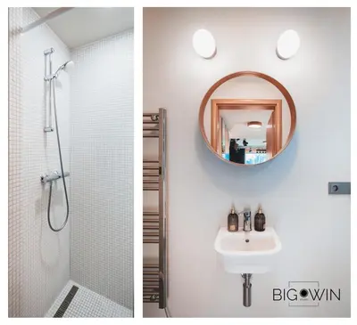 a bathroom with a shower and a sink and a mirror at Studio Big Win Mělník in Pšovka
