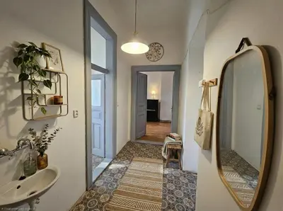 a bathroom with a sink and a mirror at Anhouse in Prague