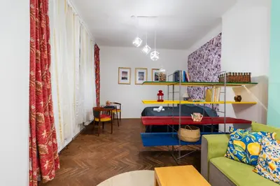 a living room with a couch and a table at Apartment in Prague 1 next to Wenceslas Square in Prague