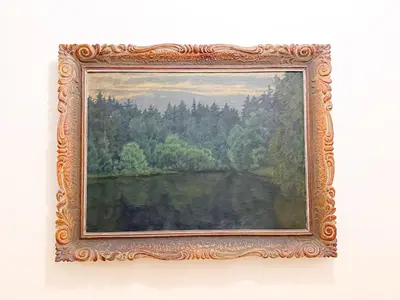 a painting of a river in a frame on a wall at Picasso Residence XXL 100m2 in Prague
