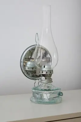 a glass lantern with balls in it on a table at Chalupa Kdovíkde in Budyně nad Ohří