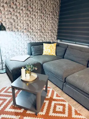 a living room with a couch and a coffee table at Central 2 Bedrooms Apartment with Living Room & Parking - Near Wenceslas Square & Main Train Station in Prague