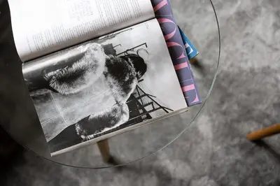a book sitting on top of a glass table at Sudomerská 5, Zizkov, Czech Republic in Prague