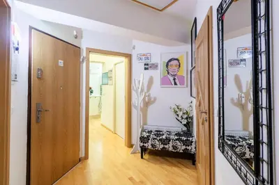 a hallway with a door leading to a room at QUIET apartment with FREE parking & balcony in Prague