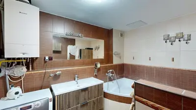 a large bathroom with a tub and a sink at La Casa Colorata apartment in the hearth of Prague in Prague