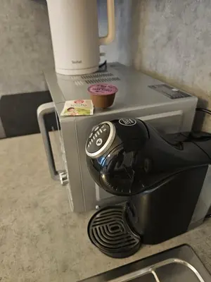 a coffee maker sitting on top of a counter at Centre NEW stylish apartment & parking near O2 Arena in Prague
