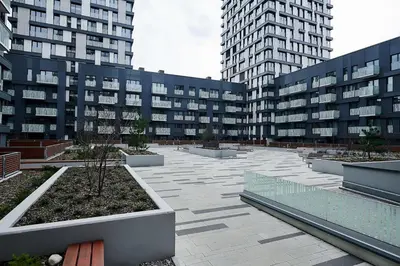 a large courtyard in a city with tall buildings at Fortuna Garden V in Prague