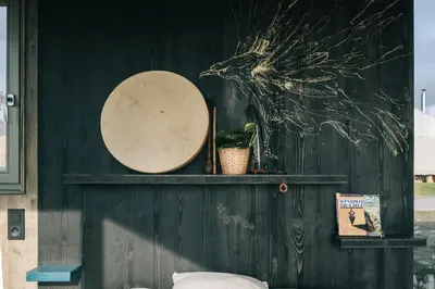 a room with a table and a bed and a window at TINY HOUSE na Řehenickém Dvorku in Řehenice